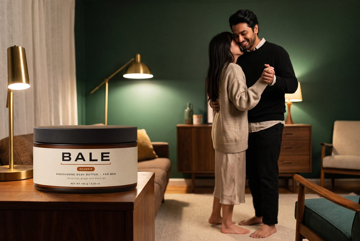Couple slow dancing at home, Reverie jar on the side table