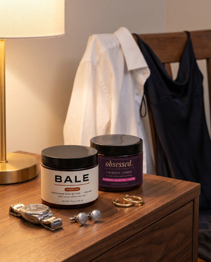 Bale Rogue 540 beside obsessed Crimson Amber on a dresser
